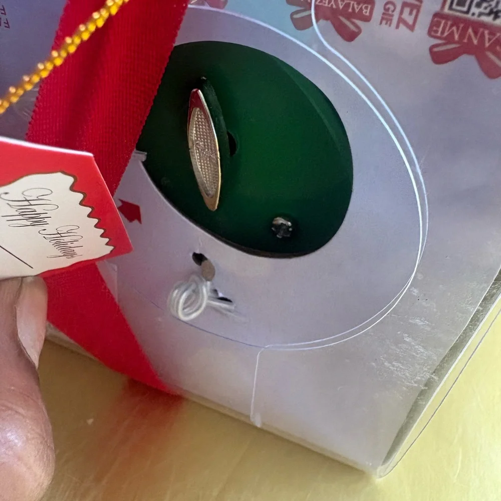 Animated Musical Carousel with Red and Green Accents - Picture 4 of 7